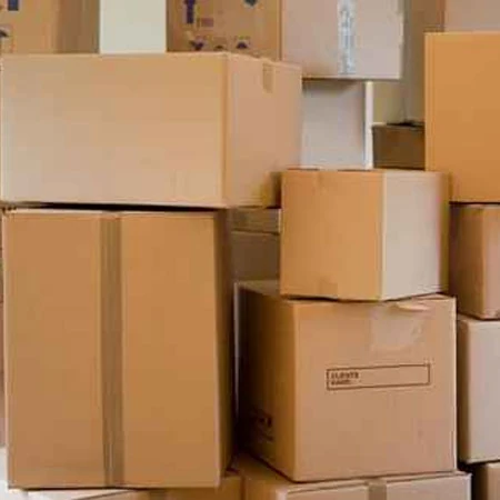 Loading household goods into containerized moving truck